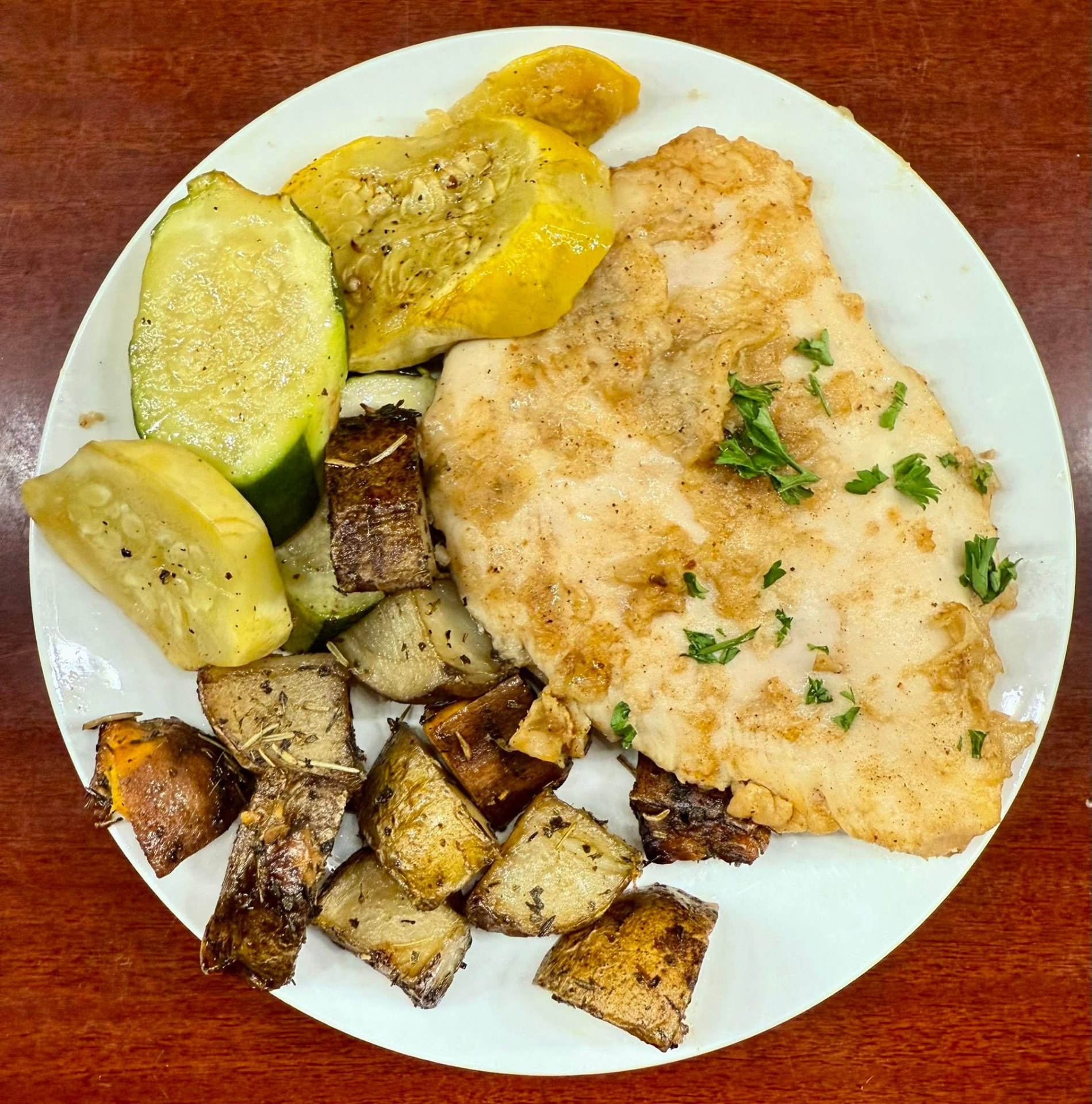 Parmesan chicken with squash and rosemary potatoes