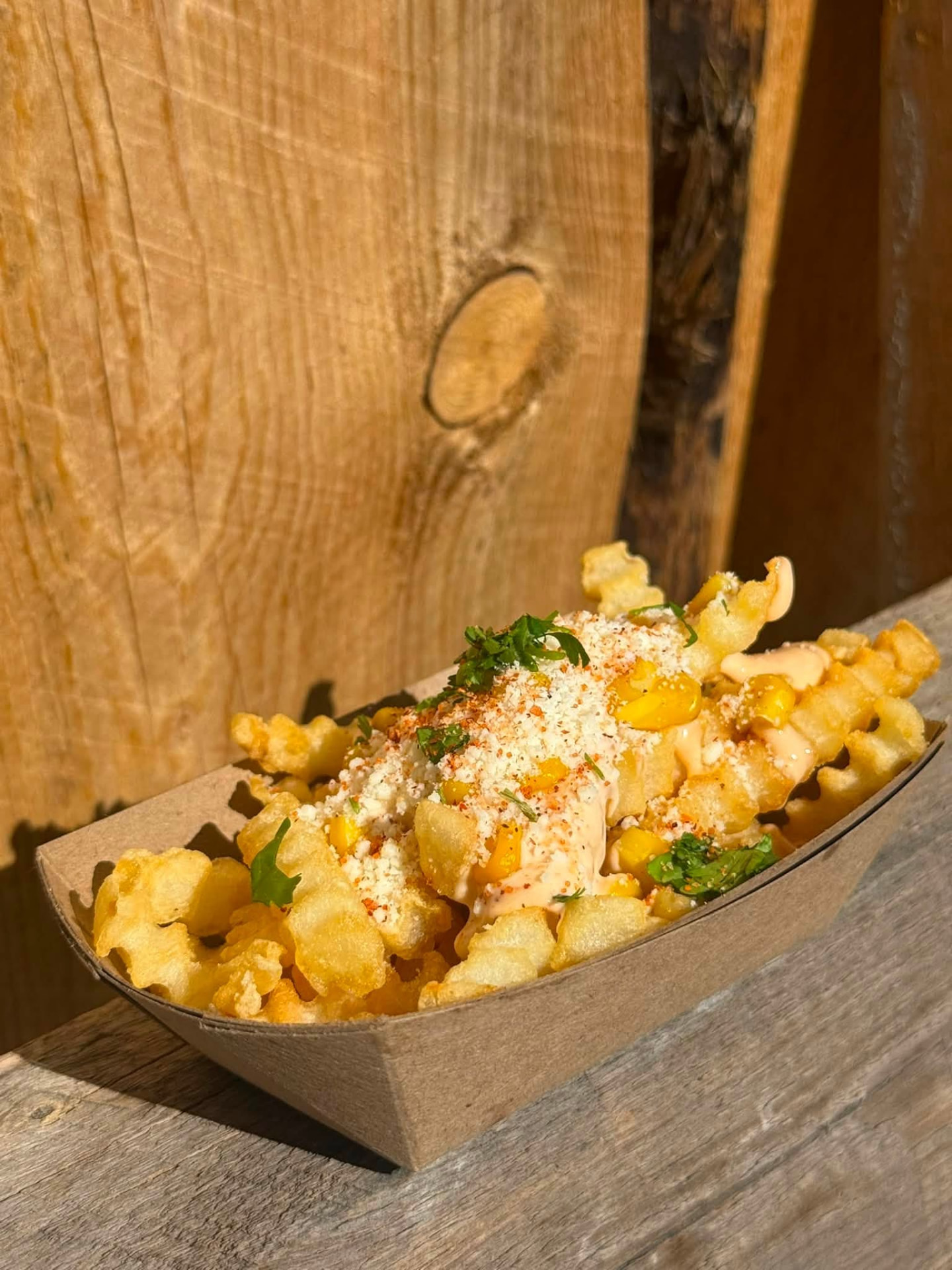 Street corn fries with cotija, chili and cilantro
