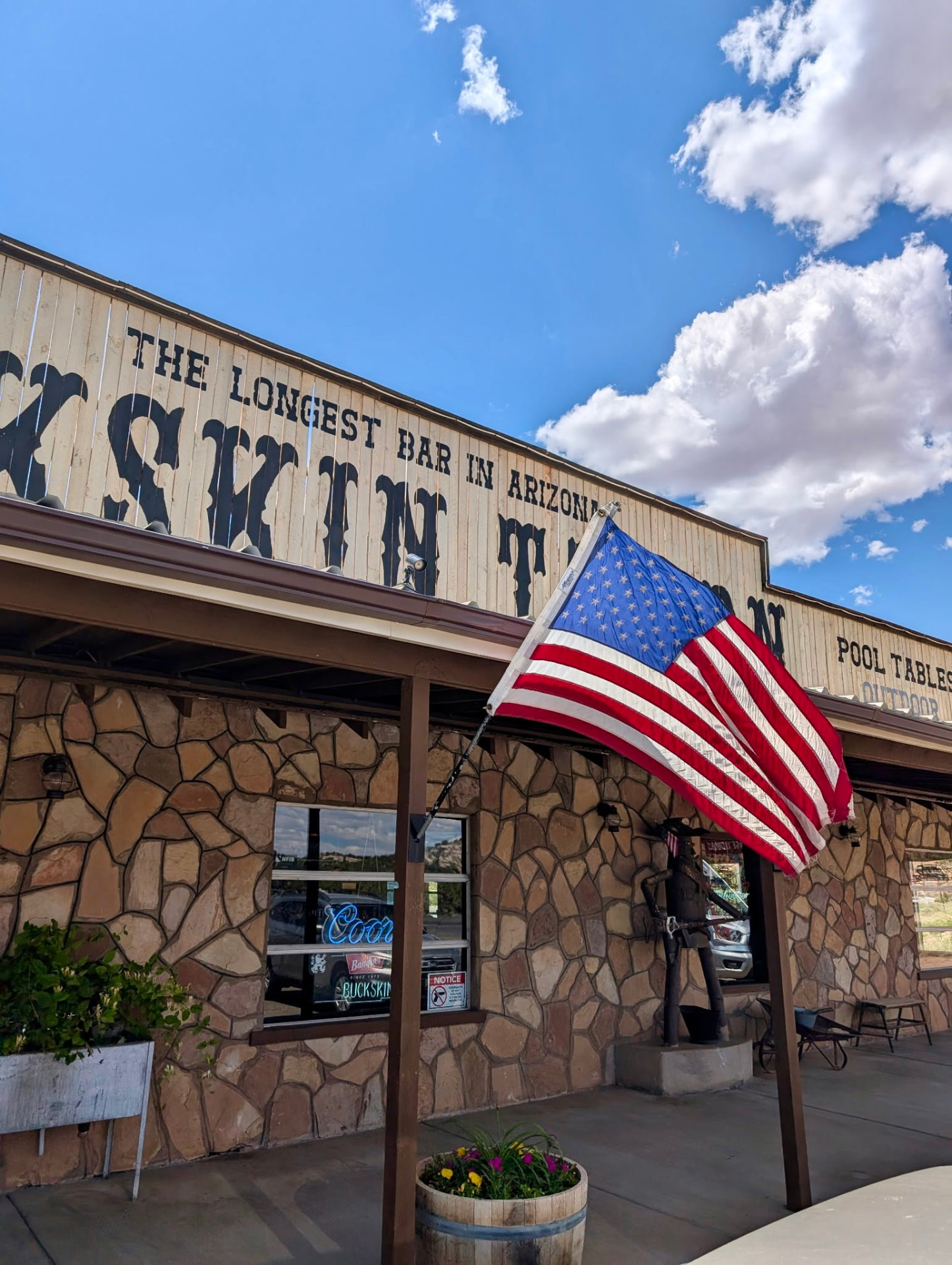 Buckskin Tavern hand-painted facade with American flag